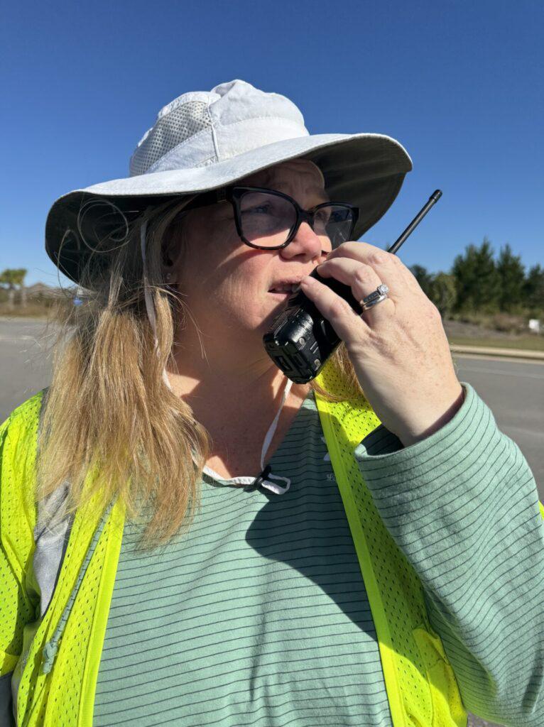 Kate demonstrating her yellow safety vest