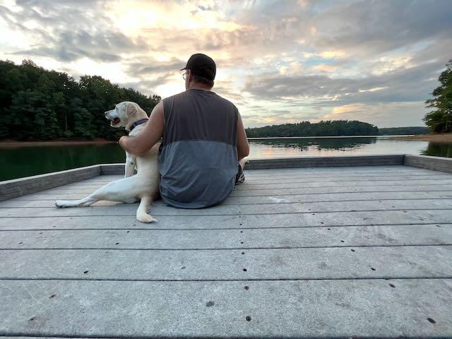 Steve and Coco enjoying the dock at sunset.