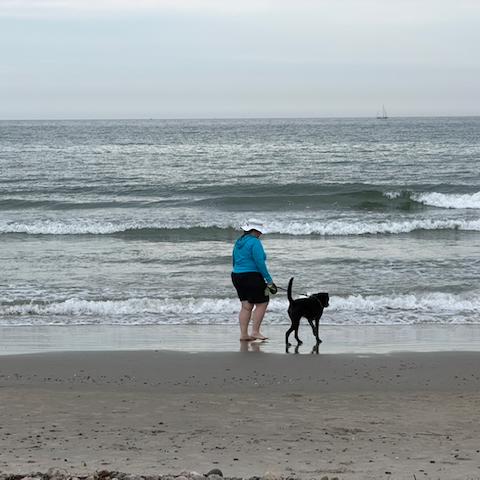 Millie isn't a fan of the waves